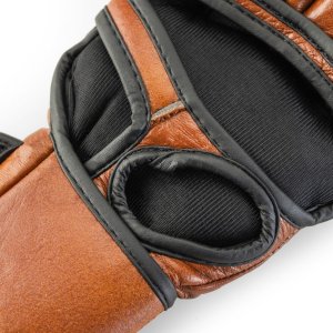 <strong>Nasze rękawice MMA w stylu Retro, wykonane ze skóry naturalnej, to połączenie klasyki z nowoczesnością, zapewniające nie tylko ochronę, ale i wyjątkowy komfort podczas każdego treningu.</strong> Rękawice MMA ze skóry naturalnej Retro Tan Evolution RM-130 - Evolution